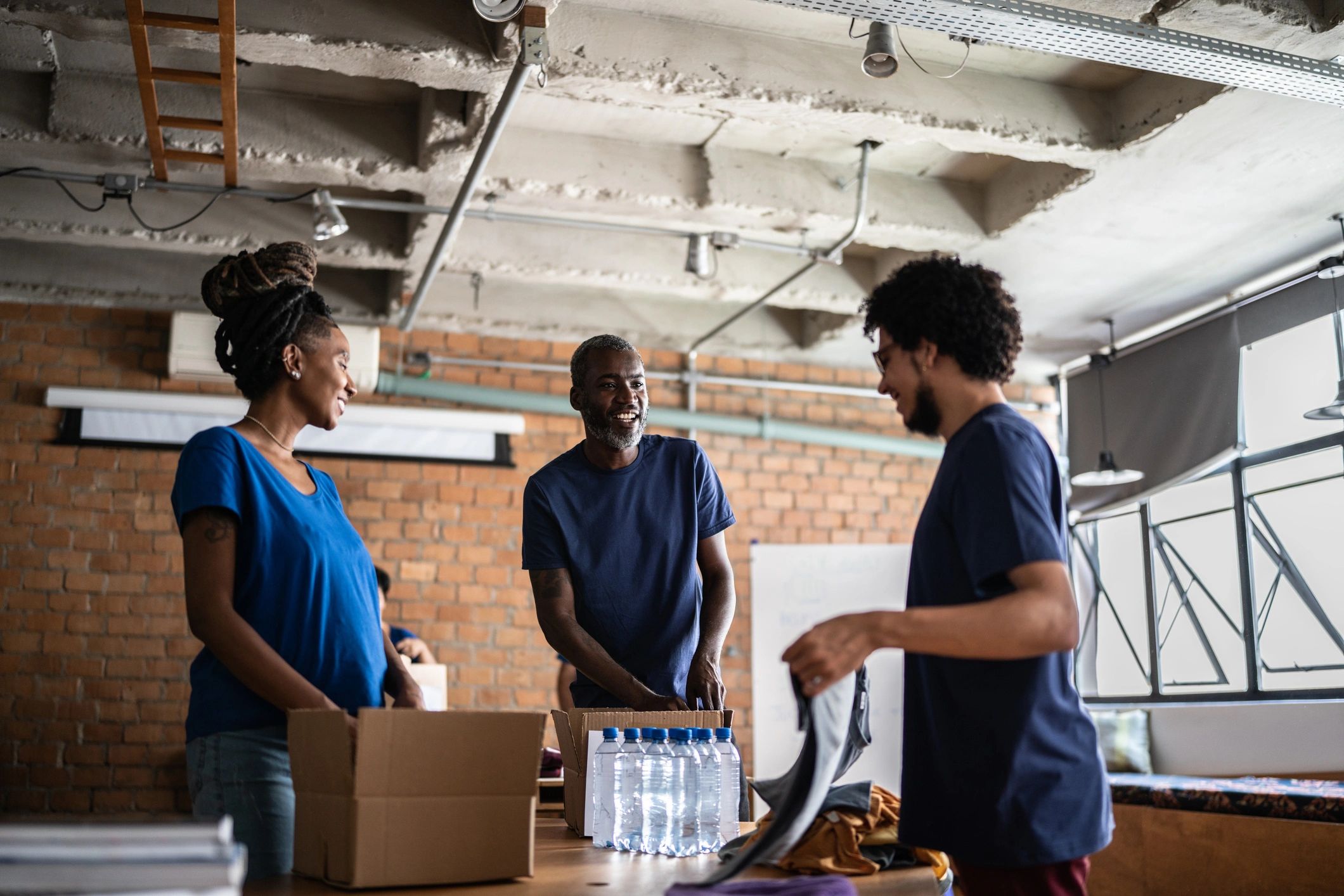 Small business team preparing and packaging customer orders
